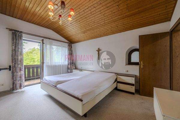 Schlafzimmer mit Balkonzugang