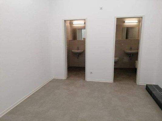 getrennte Damen-Herren-WCs