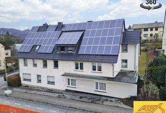 Zwei Dreifamilienhäuser mit Garage