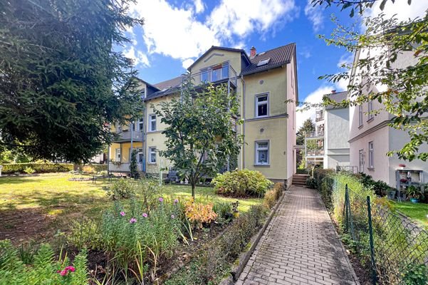 Erdgeschosswohnung mit Balkon und Garten