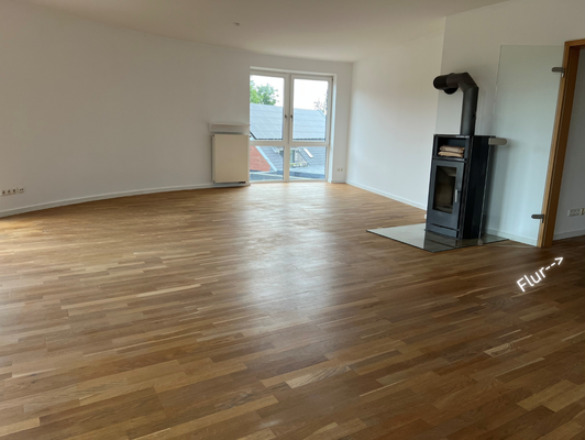 Uferstraße - Wohnzimmer mit Ofen