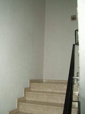 Treppenhaus zu den Zimmern