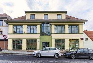 01 Ansicht Wohn- und Geschäftshaus.jpg