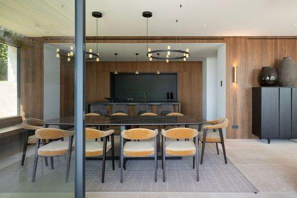 Dining room and open kitchen in villa in Portals