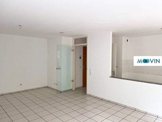 Ansicht III: Wohn- und Esszimmer mit offenem Küchenbereich