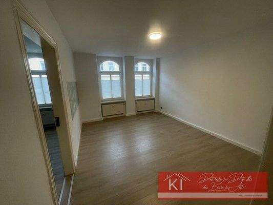 Wohnzimmer mit angrenzend Küche