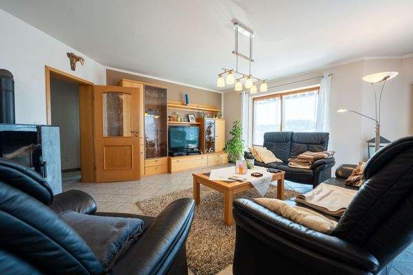 Wohnzimmer mit Kaminofen EG Whg. 1