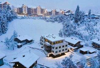 01-Aussenansicht im Winter des Investitions Wohnob