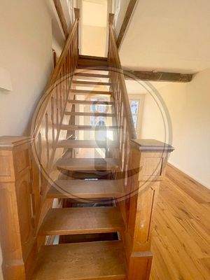 Erste Ebene mit Aufgang ins Dachgeschoss