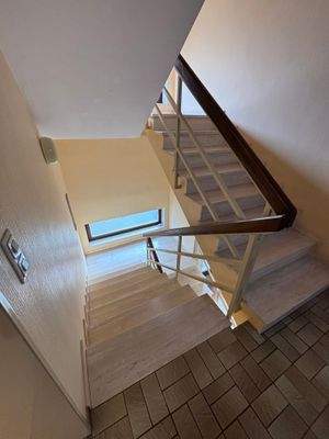 Treppenhaus zur 1. Etage in den Wohnbereich