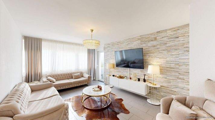 Wohnzimmer mit Zugang zur Loggia