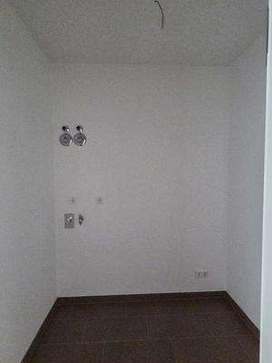 Abstellraum mit Waschmaschinenanschluss