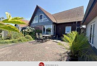 H&T Immobilien - Reihenendhaus in Weyhe