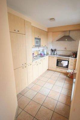 Küche mit Zugang zur Loggia