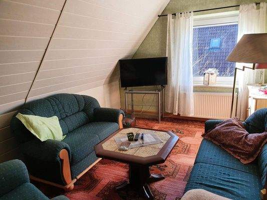 Wohnzimmer obere Wohnung