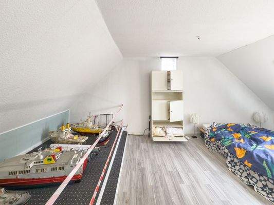 Zimmer im Spitzboden