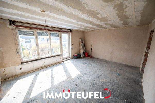 Wohnbereich mit Zugang zur Terrasse