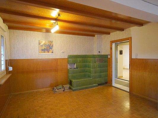 Wohnzimmer mit Kachelofen