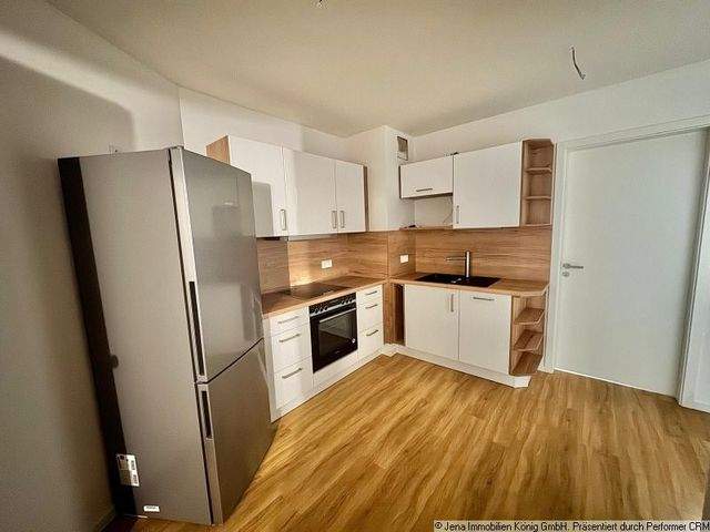 Erstbezug! Zentrumsnahe Zweizimmerwohnung mit hochwertige Einbauküche - Foto 3