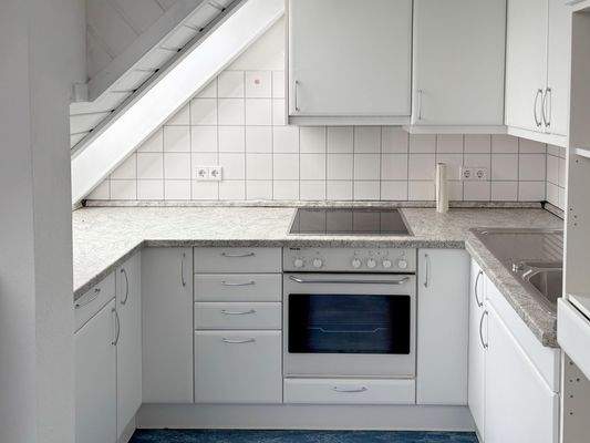 Küchenbereich mit Einbauküche