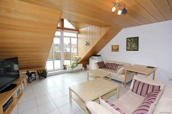 Wohnbereich mit Ausgang auf die Dachterrasse