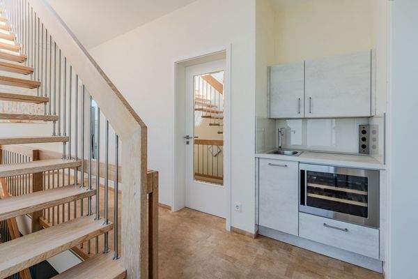 Kitchenette with wine fridge on the upper floor