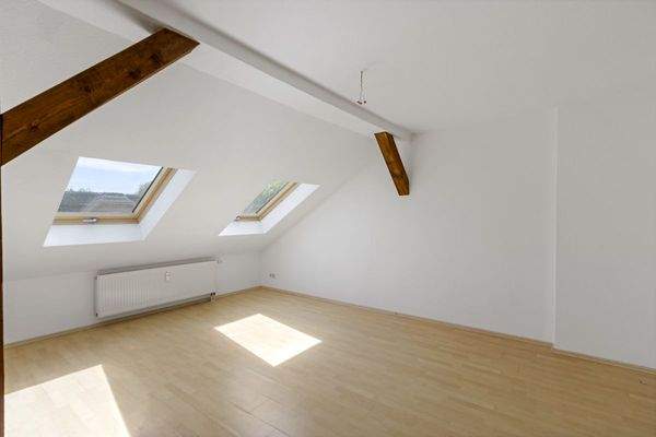 Wohnzimmer mit offener Küche