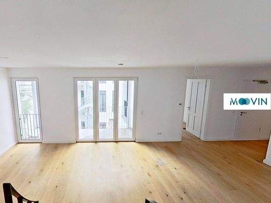 Ansicht IV: Wohn- und Esszimmer mit offenem Küchenbereich