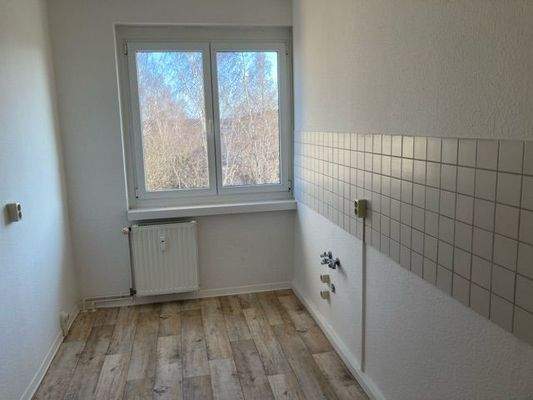 Küche mit Fliesenspiegel