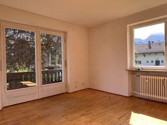 Wohnzimmer in der Wohnung 1. Obergeschoss