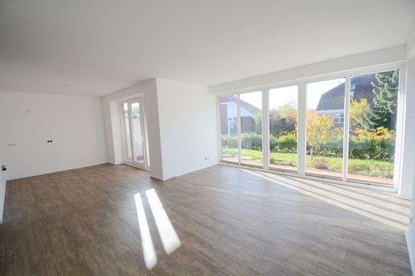 Wohn-/Esszimmer mit Terrassenzugang