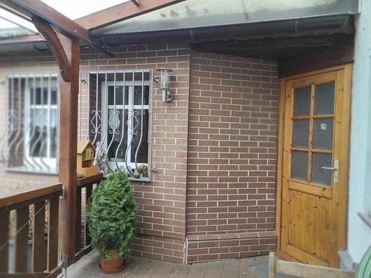Terrasse für Haus Nr. 2 mit Zugang zum Wohnraum