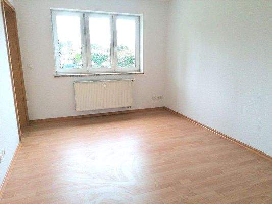 Wohnzimmer mit Laminat (Foto aus baugleicher Wohnu