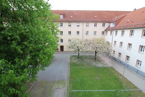 Blick in begrünten Innenhof Huttencarre