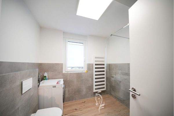 Bad mit bodentiefer Dusche