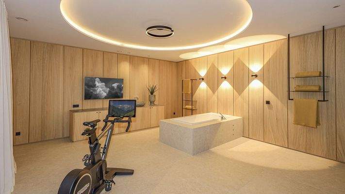 KITZIMMO-Luxuriöse Gartenwohnung mit eigenem Wellnessbereich - Immobilien Brixen.