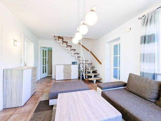 makellos 06 EFH Prerow - Diele mit Kamin WE 1.jpg