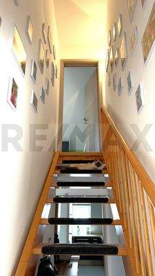 Treppe zum Zimmer im Dachgeschoss