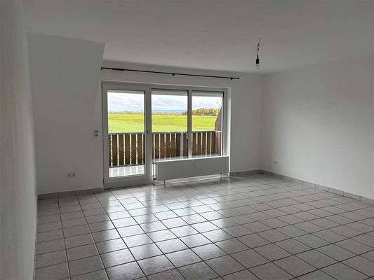 Wohnzimmer mit Balkon