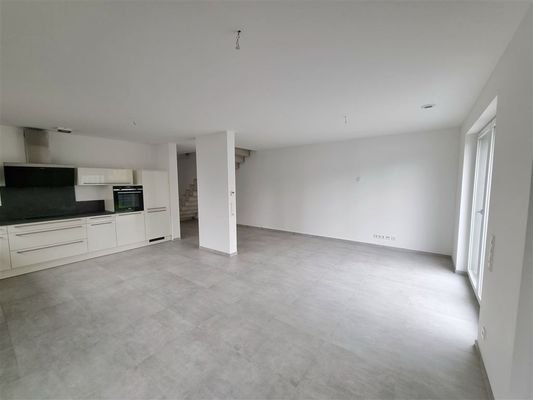 Wohnbereich mit Zugang zur Terrasse