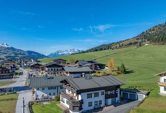 KITZIMMO-Apartmenthaus mit traumhaftem Ausblick kaufen - Immobilien Fieberbrunn.