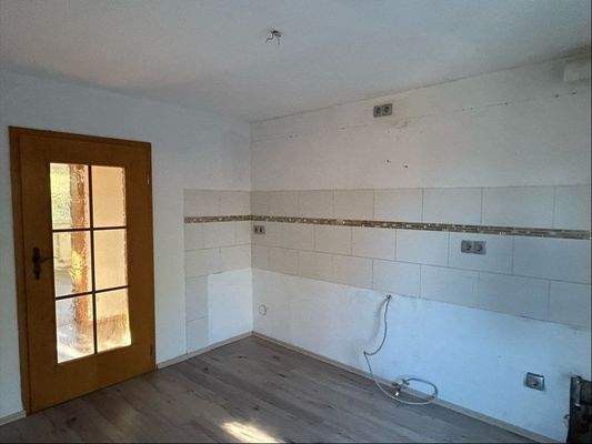 Küche mit Fliesenspiegel