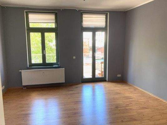 Wohnzimmer mit Terrassenaustritt