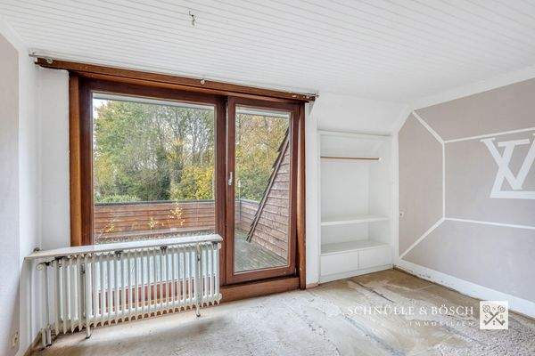 Kinder- oder Gästezimmer mit Balkonzugang