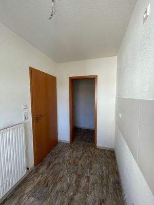 7 - Küche mit Hauswirtschaftsrtaum