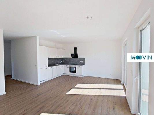 Ansicht V: Wohn- und Esszimmer mit offenem Küchenbereich