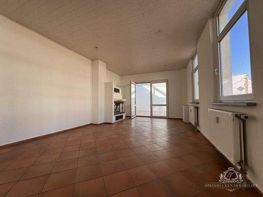 Wohnzimmer mit Kamin