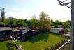 Blick vom Balkon zum Garten