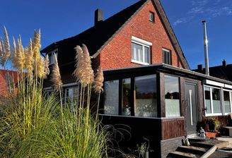 Wintergarten mit Terasse an der Südseite