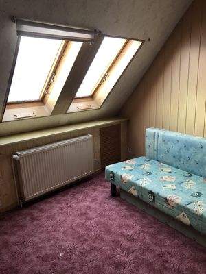 Zimmer im Dachbereich